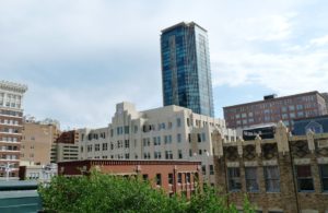 A shot of the downtown area in Fort Worth, with a single skyscraper in the background. 