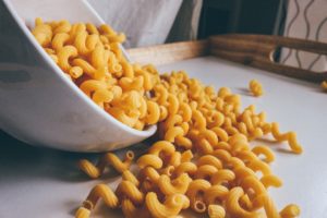 A bowl of raw macaroni. 