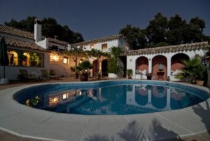 An estate home with an in-ground pool