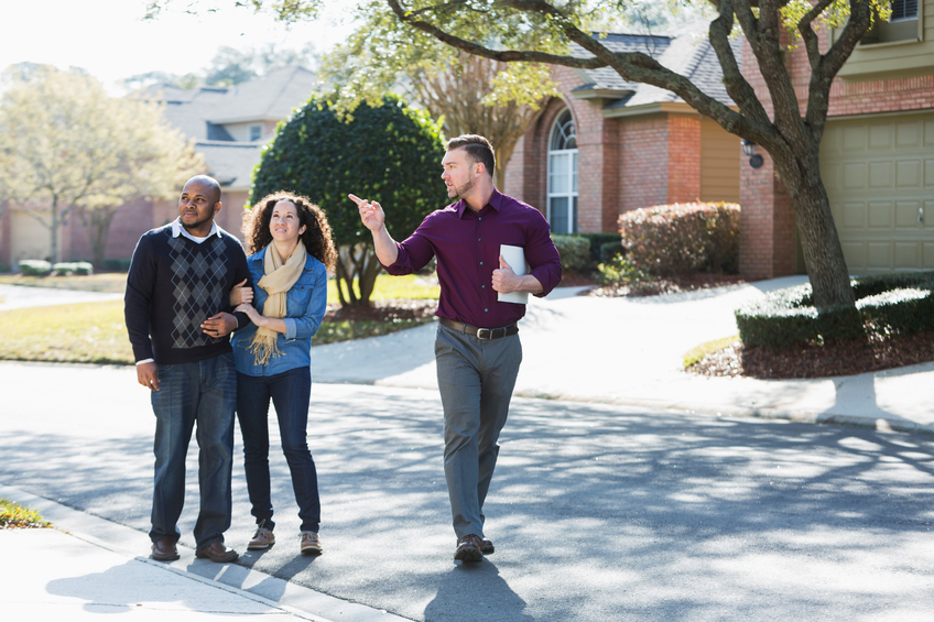 Buyers on a tour of homes during the winter.