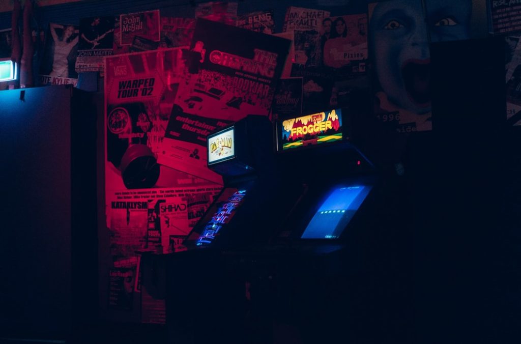 Glowing arcade games, an indoor attraction.