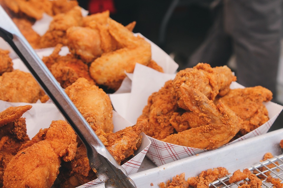 Trays of fried chicken. 