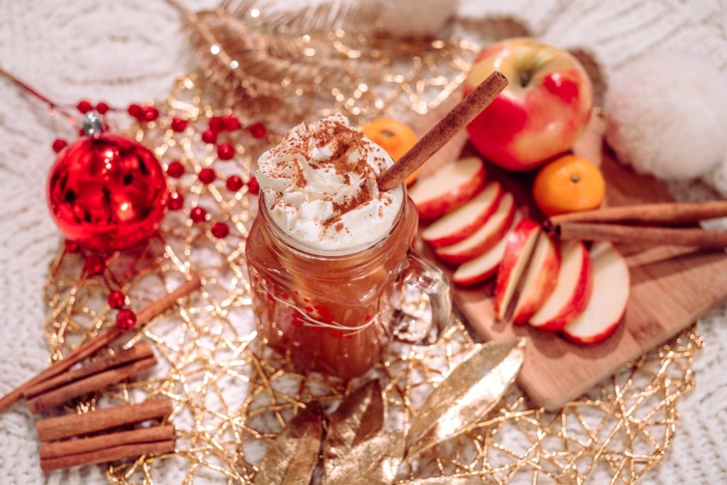 Warm cider and holiday snacks during a home staging. 